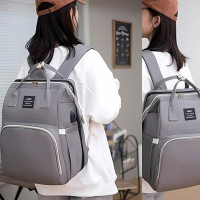 sac-a-dos-a-langer-diaper-backpack-porter-par-une-femme